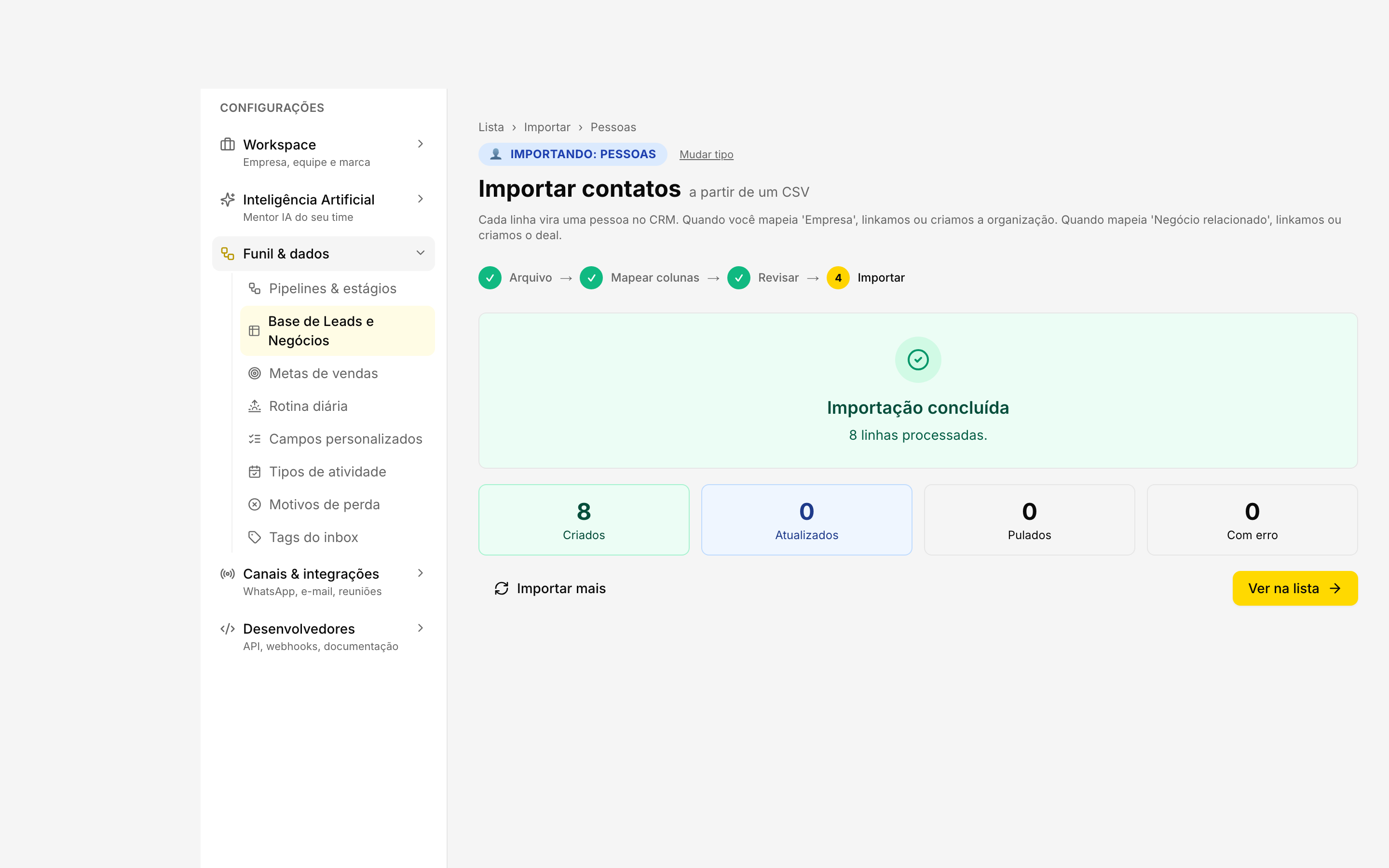 Resumo pós-importação mostrando os totais de "criadas" e "atualizadas"